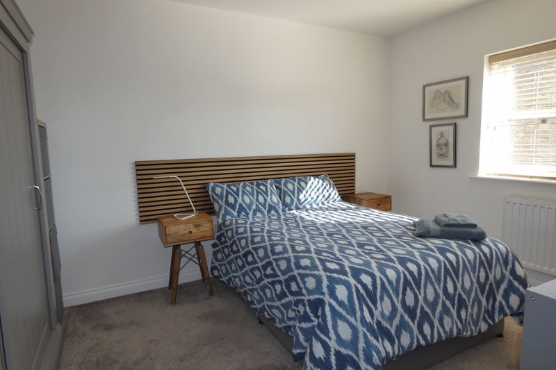 Bedroom One- click for photo gallery